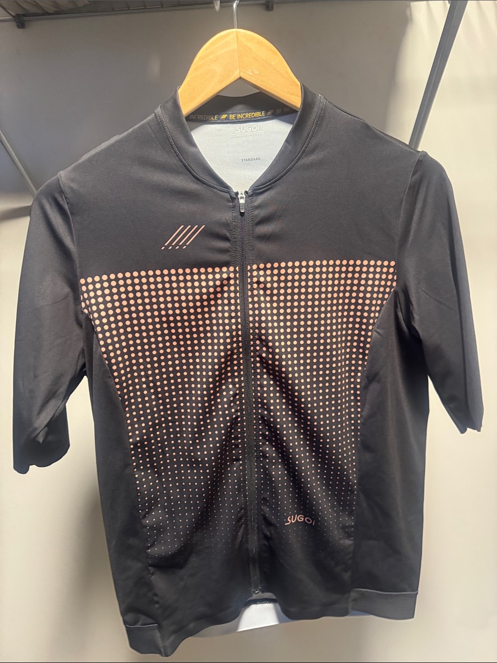 SUGOI Black Cycling Jersey with Copper Dot Pattern
